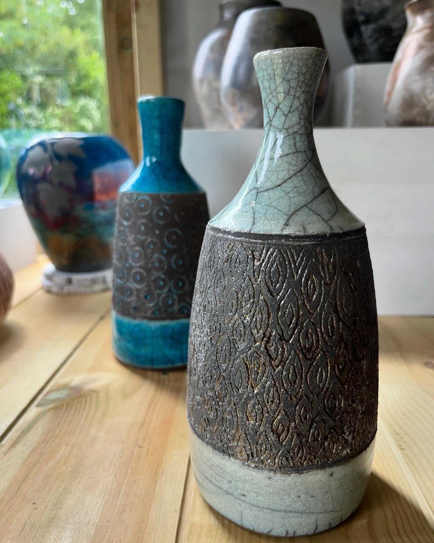 Raku narrow-necked vase/bottle in turquoise