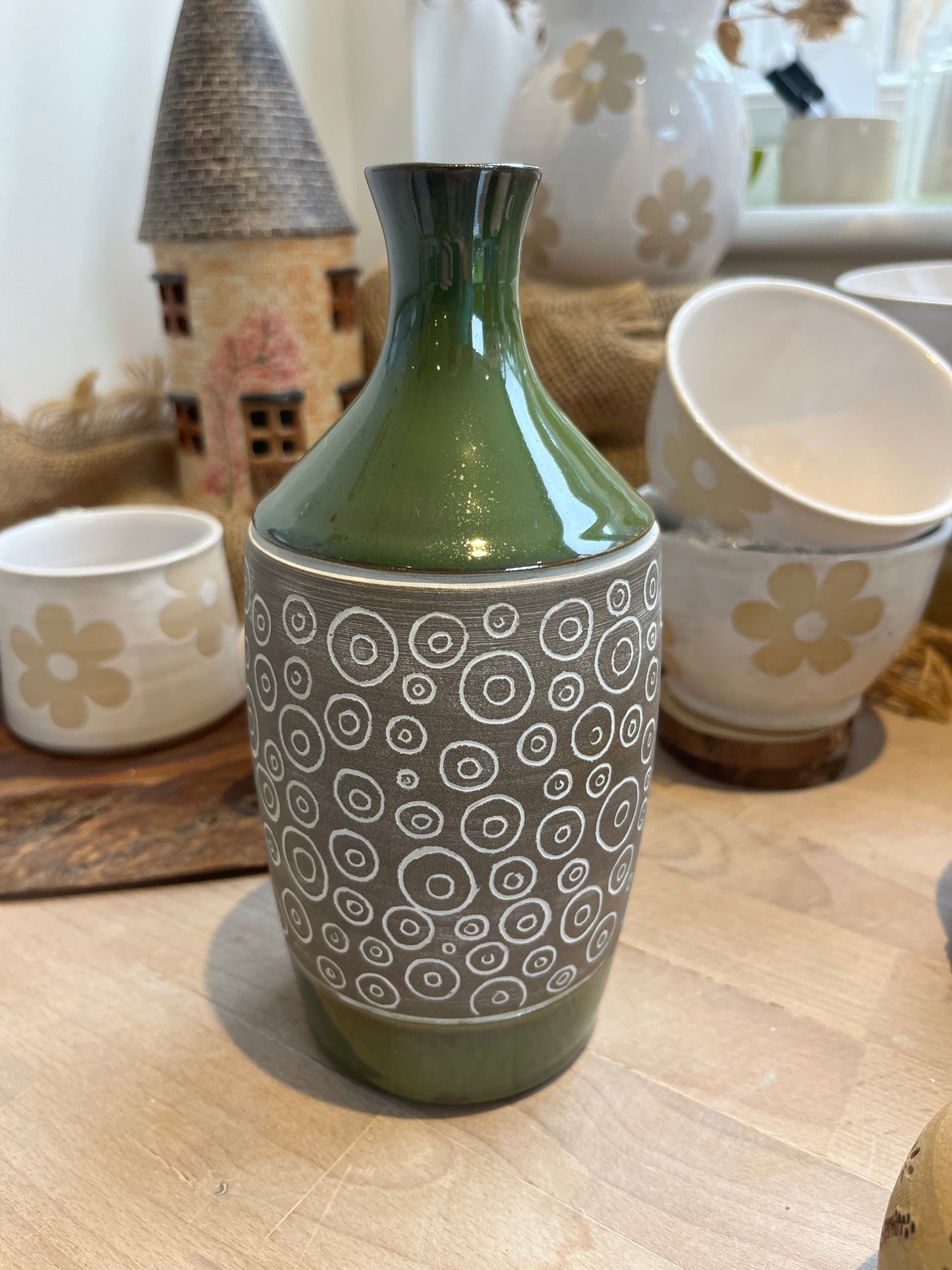 Green carved stoneware narrow necked vase