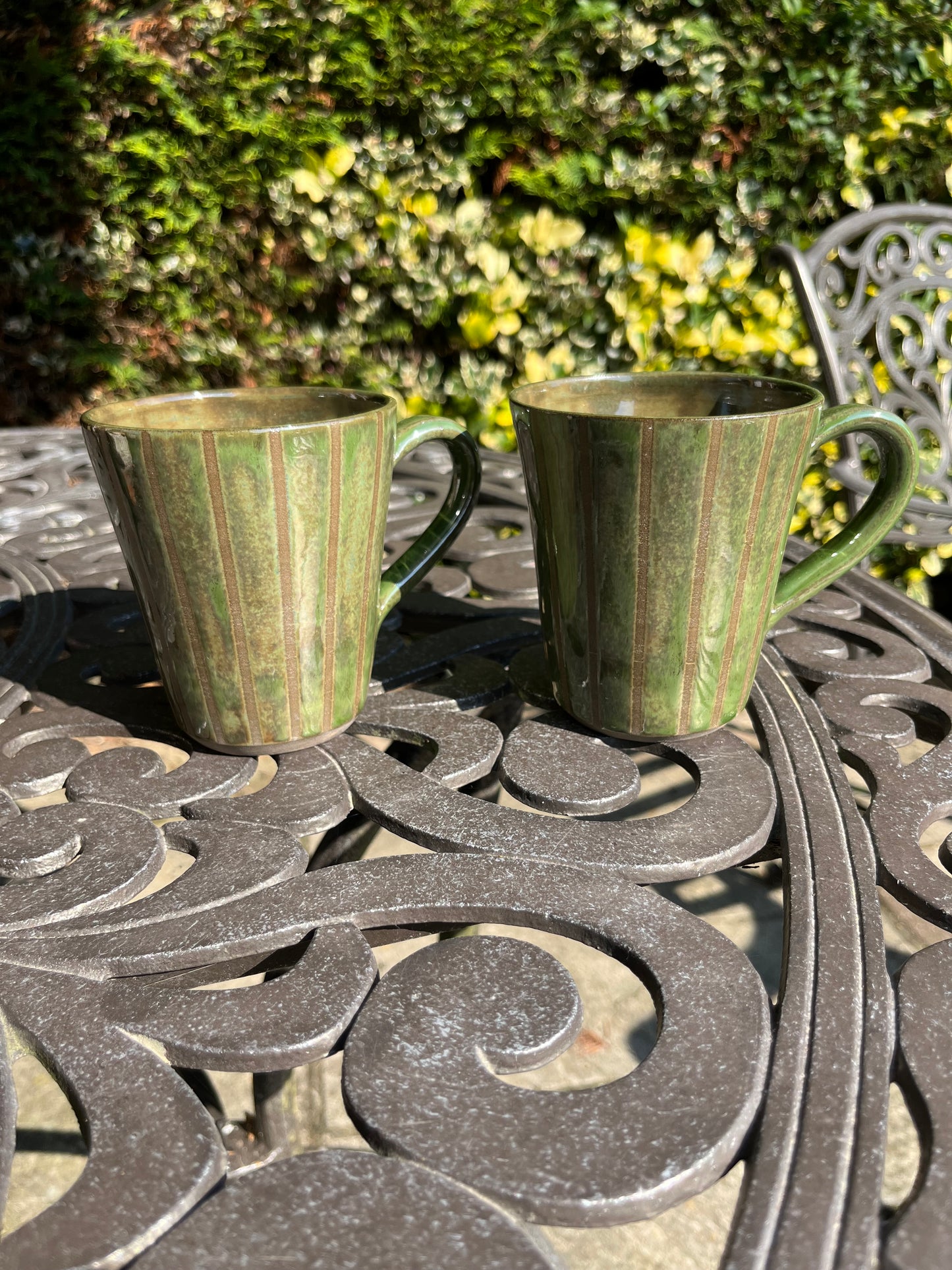 Green striped beaker mugs