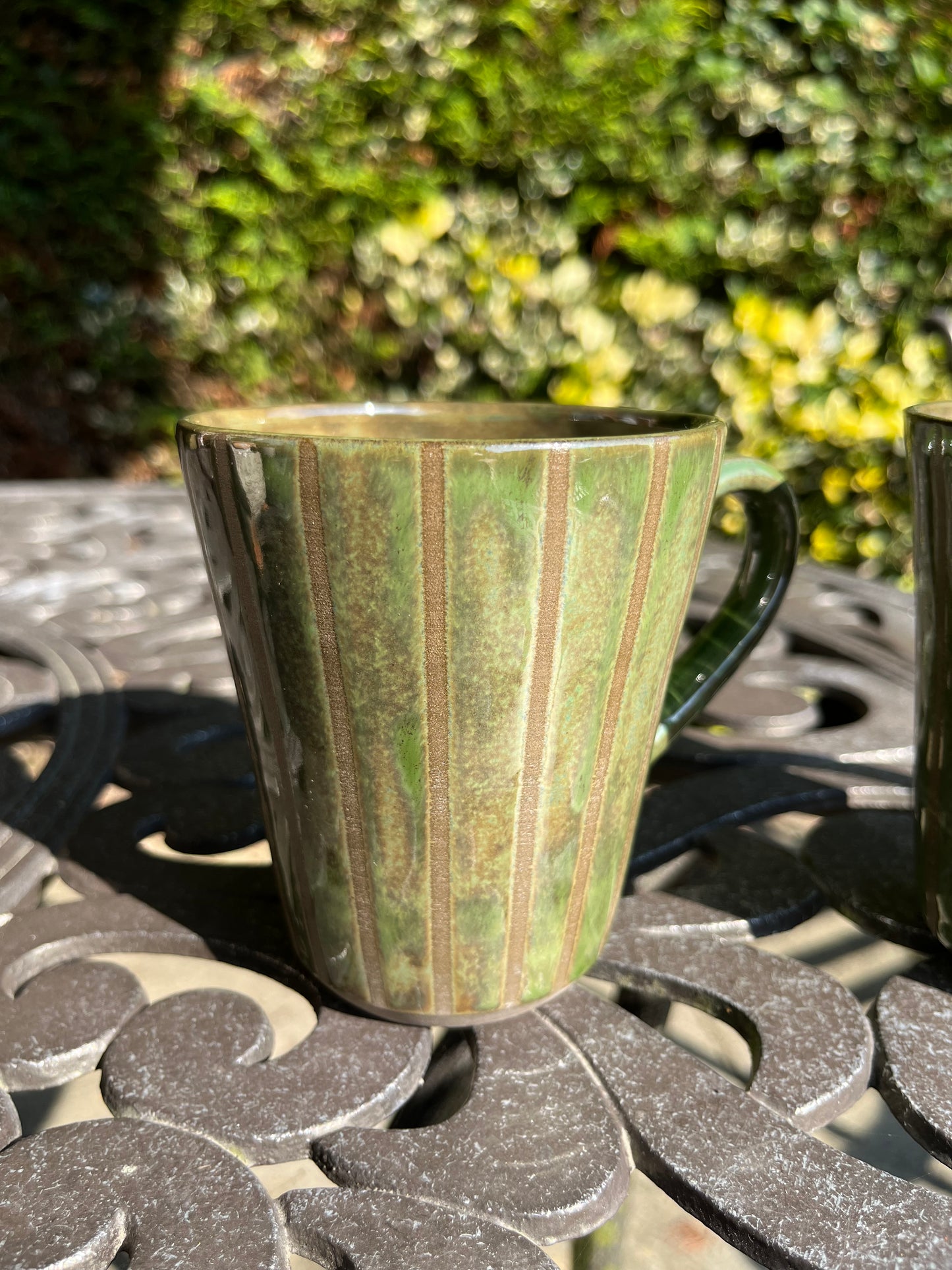Green striped beaker mugs