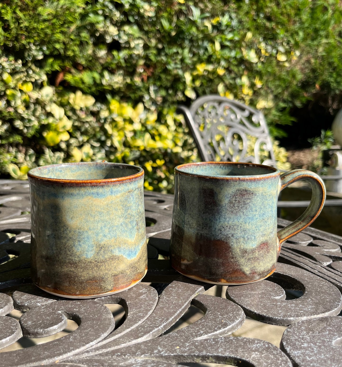 Misty earth-toned blue, brown, stoneware mugs