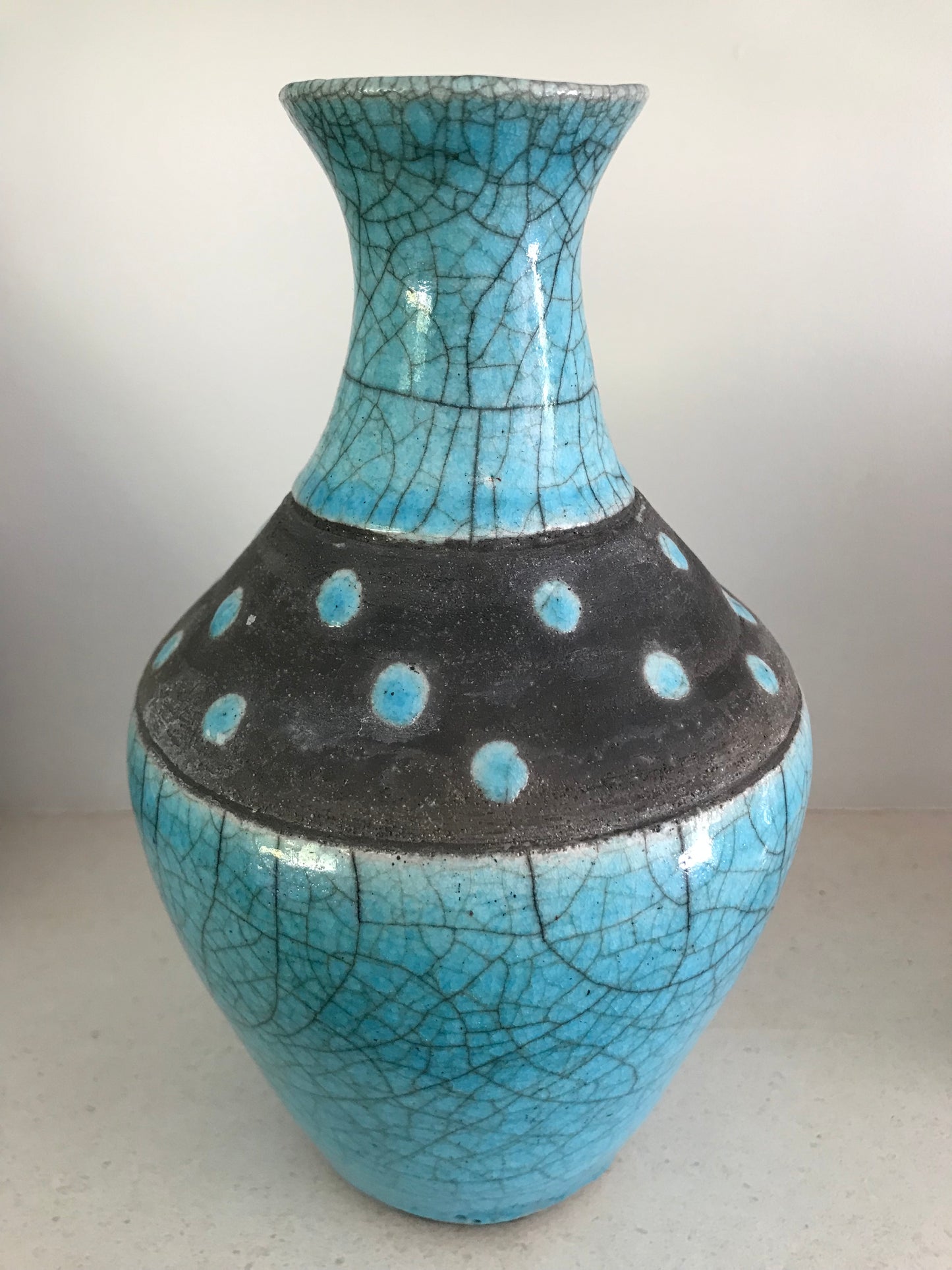 Turquoise polkadot vase